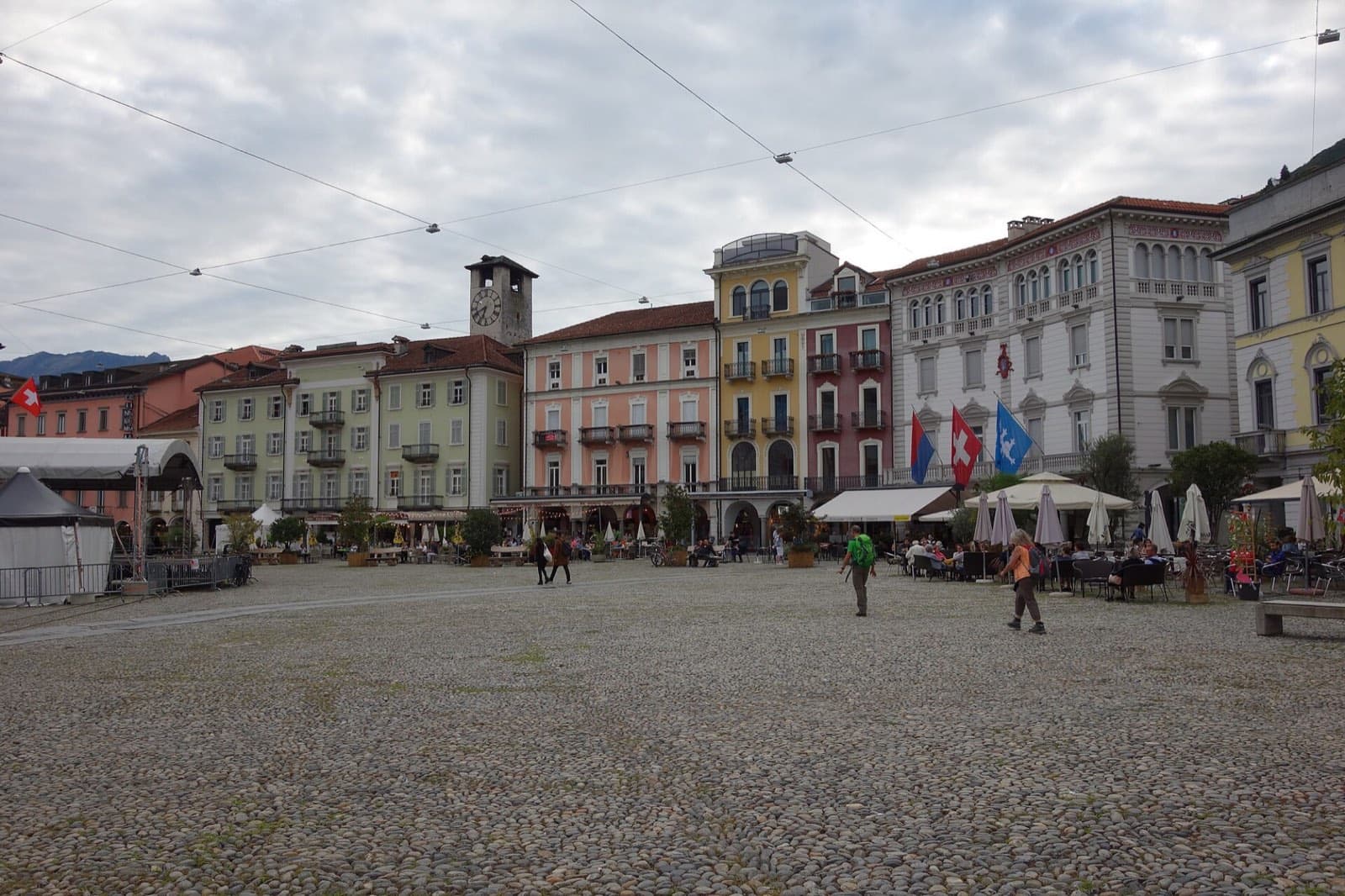 The arcaded Piazza Grande in Locarno, with its clock tower and painted facades.